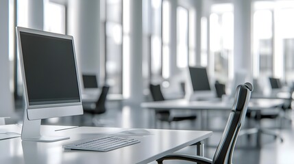 Modern office with vacant desk and chair by large windows