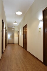 Bright and clean empty corridor of a polyclinic.