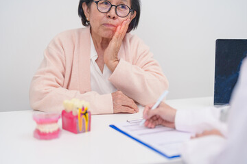 Elderly Patient consulting Dentist to Tooth disease, Senior Health Medical Diagnosis. Anatomy teeth...