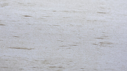 White textured surface with subtle grain patterns, ideal for backgrounds or design projects
