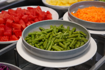 Indonesian salad, captured on April 8, 2025. A fresh mix of vegetables and traditional ingredients, served with rich peanut sauce for a flavorful and healthy dish