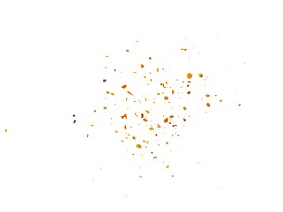 Dried red chili powder flying. Grainy scatterings of spicy burst . Splashes of red pepper powder.Overlay effect chilli or paprika spice splatters.