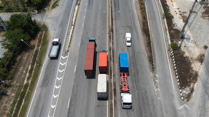Top View of container with trucks at logistic center stock