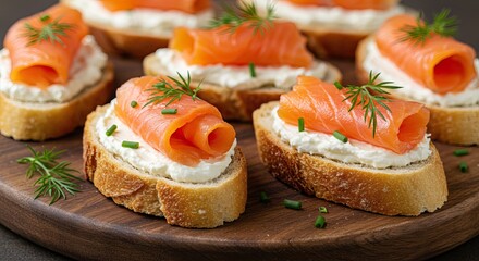 Delicious smoked salmon appetizers with cream cheese and dill on rustic bread