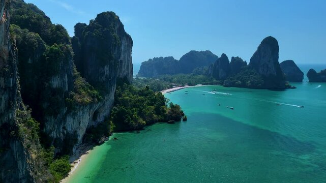 Explore the dramatic cliffs and crystal-clear waters of Thailands coastline, where lush greenery meets serene beaches. A perfect destination for adventure and relaxation. Tonsai Beach Krabi
