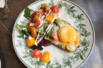 Delicious brunch platter with vibrant ingredients in a cozy cafe