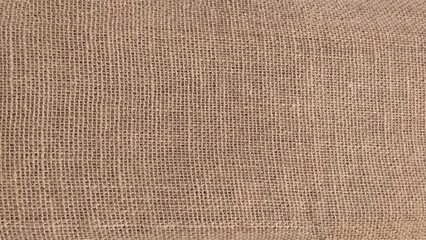 Close-up of fabric woven from burlap photo. Old burlap texture pattern background