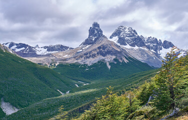 A landscape of Estero Parada Valley in a way to the camping Neozelandes in the Cerro Castillo National Park. Cerro Palo and Cerro Chocolate loom in the background. Tourism along the Carretera Austral.