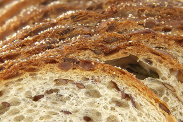 Close-Up of Multigrain Bread Slices With Seeds Highlighting Texture and Details