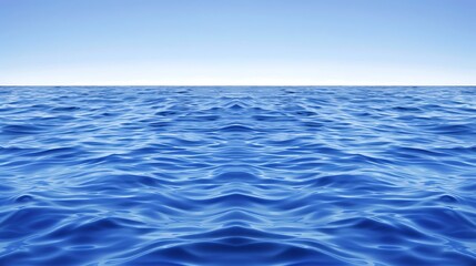 Obraz premium A serene view of the rippling ocean surface under a clear sky.