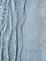 Beautiful small sea waves clean transparent water sandy beach of sea shore