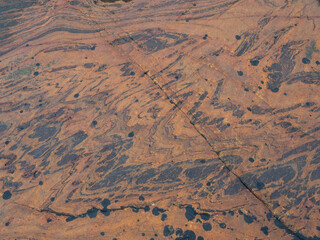 Rocks with geological folds on the shore of the White Sea