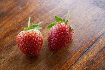 Close up of strawberries on a wooden table