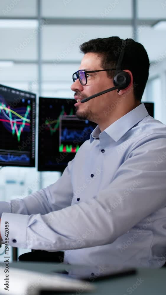 Poster hispanic man looking at multiple screens