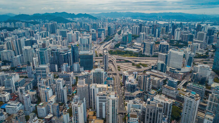Fototapeta premium Spectacular cityscape aerial view with complex road network and towering buildings