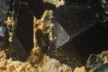 Mineral Cuprite (red copper ore) and silver crystals. Microphotography with high magnification-...