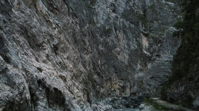 Drone Tilting Up View Of Steep Cliffs in Taroko Gorge, Taiwan