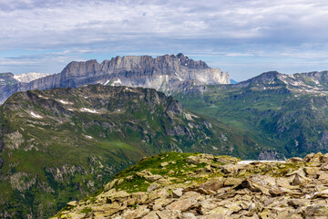 Chamonix Montblanc beautiful alpine mountain summits landscape. Alps mountains with snow and glacier above green valley of Chamonix in France. Alps beautiful scenery in summer