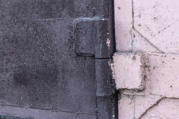 Metal door hinges on the garage door