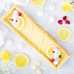 Easter Lemon Tart with Raspberries and Mini Meringues – Homemade Spring Delight.