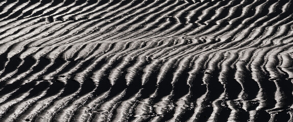 SEA BEACH - Wavy wet sand on the coast