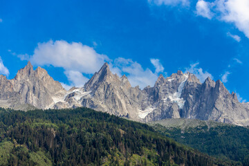 Fototapeta premium Mont Blanc, Monte Bianco mountain summit snow dome above the Chamonix valley in France. Highest peak in Europe in the Alps, alpine scenic view of Montblanc