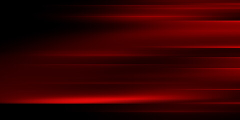 The effect of red light in fast motion on a black background. blurred abstract background with long exposure. neon light
