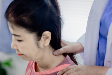 The lady came to massage the neck.