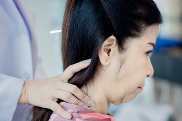 Fototapeta premium The lady came to massage the neck.