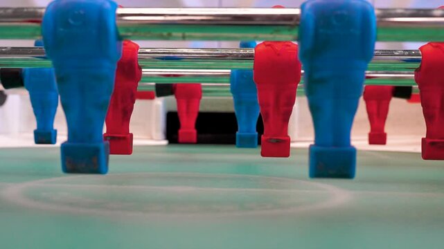 A man practices kicker table football throws, Recreation and leisure concept. Saint Petersburg, Russia - 6 Apr 2025