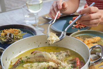 Various Mediterranean dishes served on the restaurant table	