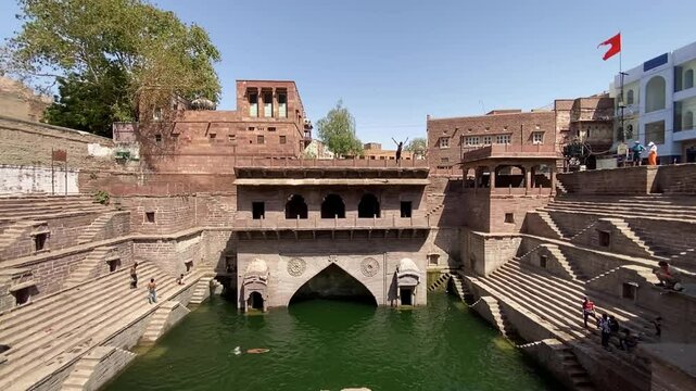 A Boy Diving in Step Well Of Jodhpur, Toorji ka jhalra stepwell Jodhpur, Ancient stepwell in Jodhpur,