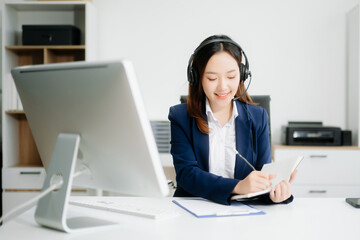 Serious call center operator in wireless headset talking with customer, woman in headphones