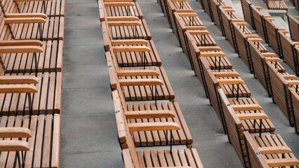 empty wooden classic park benches without people