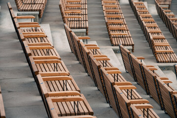 empty wooden classic park benches without people