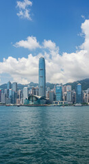 Fototapeta premium Hong Kong Skyline: Victoria Harbour View - Skyscrapers, Cityscape & Azure Waters