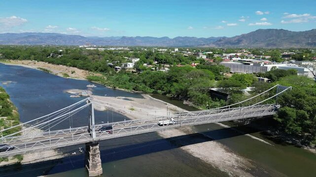 Aerial view of metal bridge in Choluteca, Honduras, rural development area