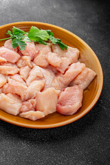 Chicken raw meat pieces of meat poultry tasty fresh delicious gourmet food background on table rustic food top view copy space keto and paleo diet