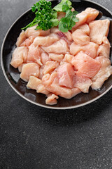 Chicken raw meat pieces of meat poultry tasty fresh delicious gourmet food background on table rustic food top view copy space keto and paleo diet