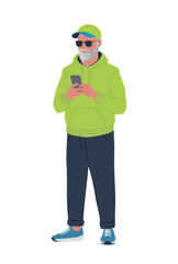 Senior man standing in casual urban clothes, hoodie, cap, sunglasses, using smart phone. Colorful flat vector illustration isolated on trabsparent  background