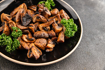 Mushroom fried champignon vegetable dish fresh gourmet food background on the table rustic food top view copy space vegetarian and vegan food