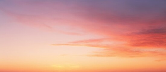 Sky with colorful sunset or sunrise featuring orange pink and purple hues.