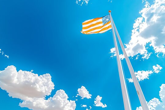 Flag waving with sunny sky, and outdoors.