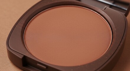 Fototapeta premium Warm brown pressed powder compact soft light. AI Generated