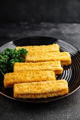 Fish sticks seafood fish fingers dish fresh gourmet food background on table rustic food top view copy space pescetarian diet