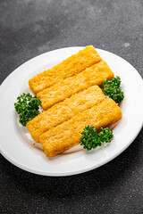 Fish sticks seafood fish fingers dish fresh gourmet food background on table rustic food top view copy space pescetarian diet