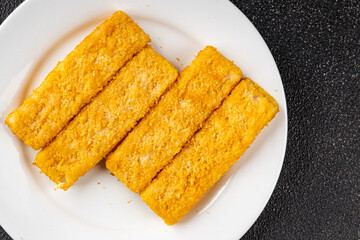 Fish sticks seafood fish fingers dish fresh gourmet food background on table rustic food top view copy space pescetarian diet