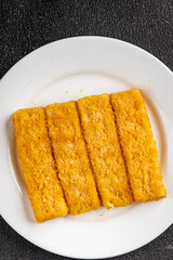 Fish sticks seafood fish fingers dish fresh gourmet food background on table rustic food top view copy space pescetarian diet