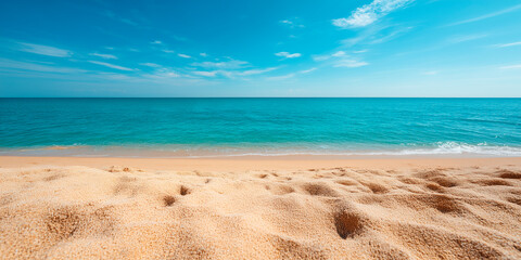 Beach with a clear blue ocean. The sand is white and the water is calm. There are no people or objects visible in the image