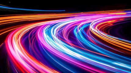 Abstract dynamic light trails forming a colorful curved composition on black
